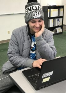 A student works on a project in class.
