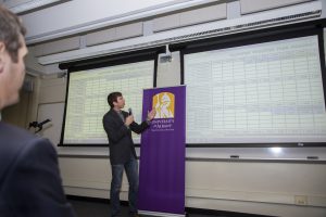 A researcher at the University of Albany demonstrates the features of a new extreme weather dashboard available to school districts.