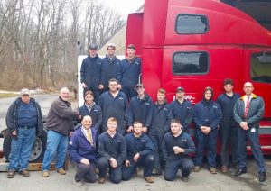 Diesel Technology students pose with 2005 Cummins Volvo truck donated to Capital Region BOCES by Timco Transportation.