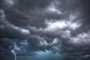 Dark storm clouds with lightening bolt