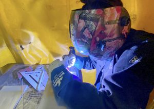 Darielys Maya, Capital Region BOCES welding graduate practicing welding skills