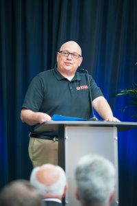 Capital Region BOCES Senior Executive Officer, Joseph P. Dragone, Ph.D. speaks at a podium