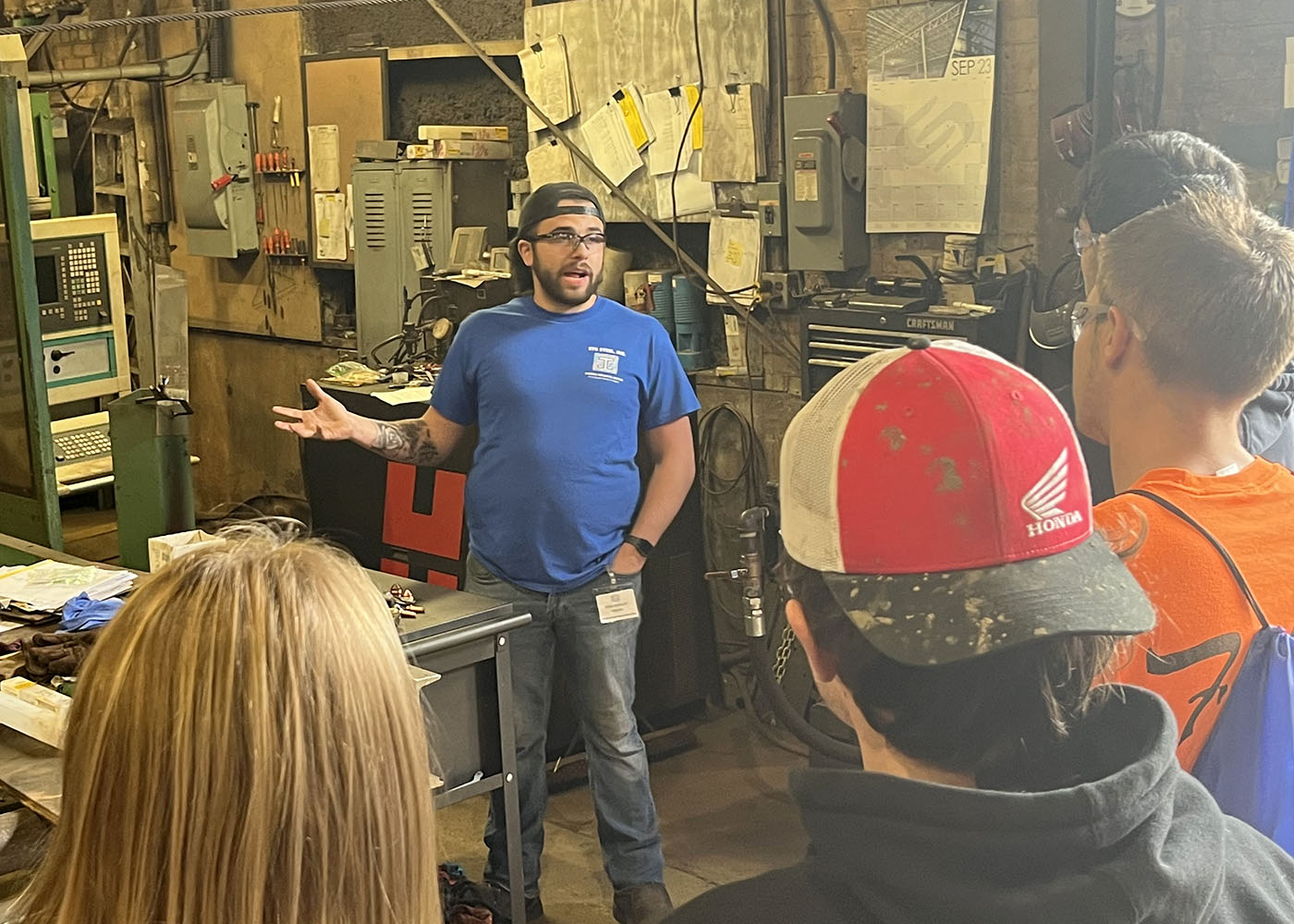 Mike Palleschi, a 2019 graduate of the Welding and Metal Fabrication program, speaks to the class.