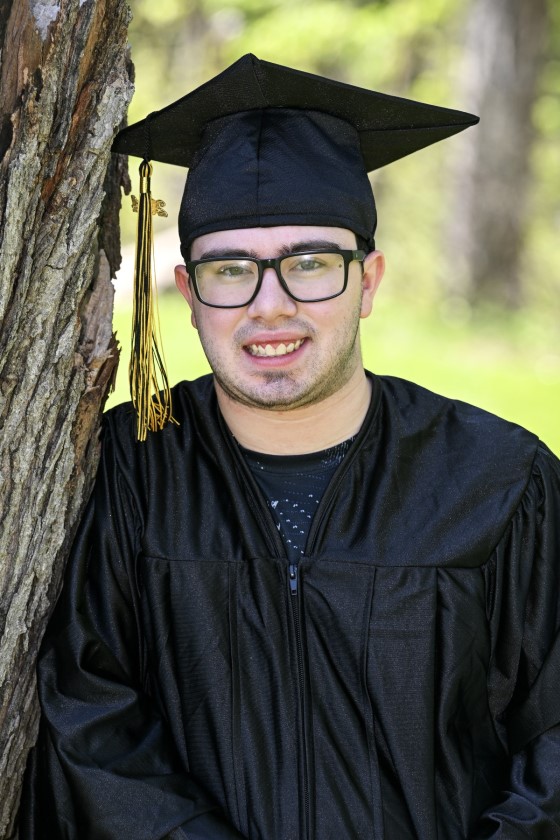 student in cap and gown