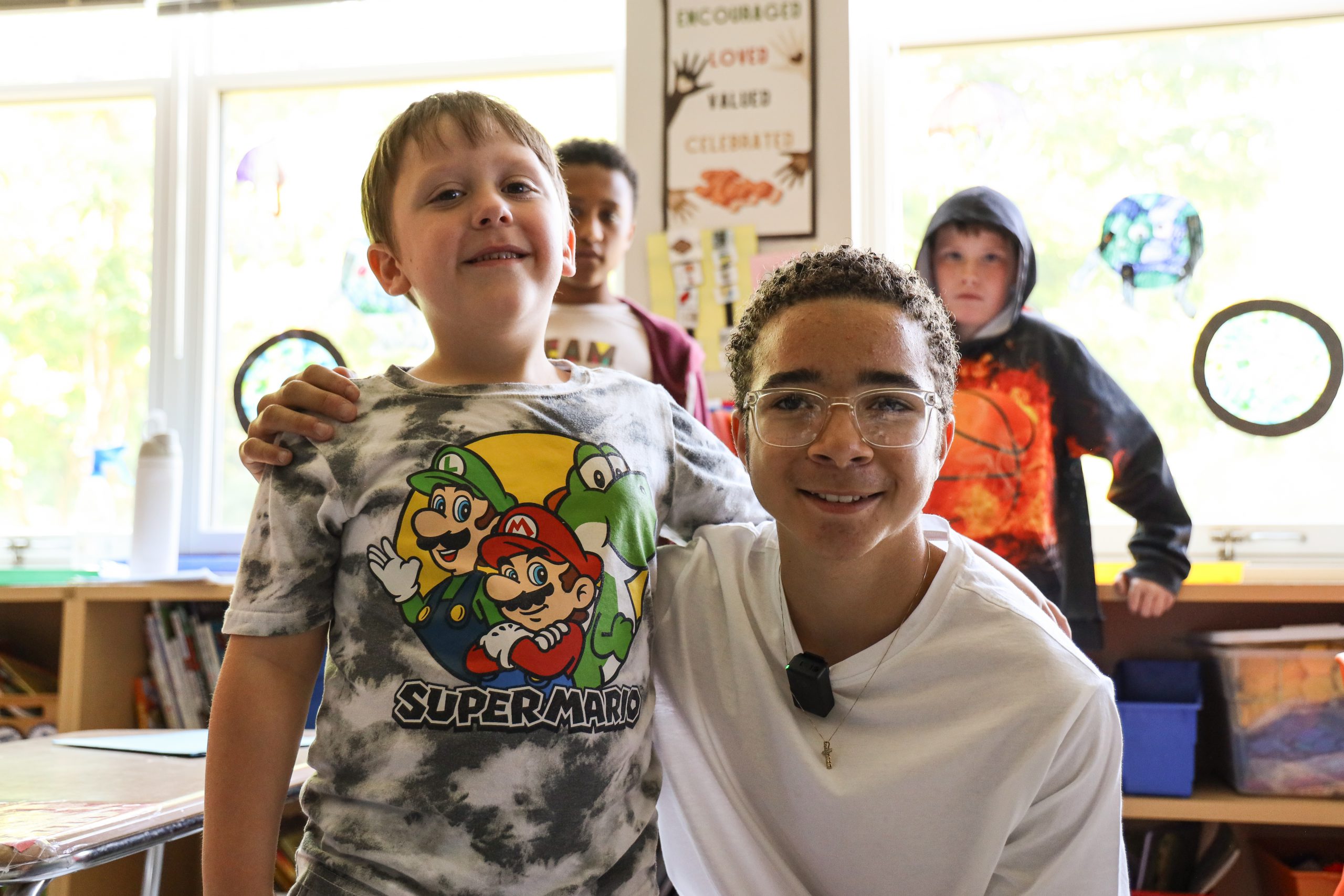 Two students pose
