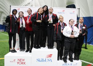 Competition winners pose last year
