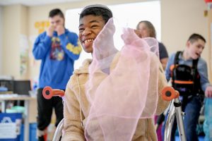 Student Arianna Burdick-Cozzolino, Scotia-Glenville, dances during the Hangout Program.