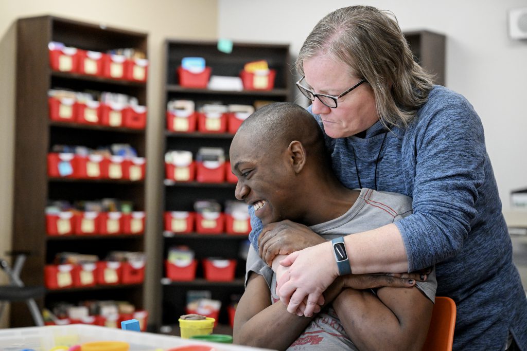 Evan Sheppard, of Mechanicville, with his teaching assistant Renée Howland during hangout session program at Maywood Academy.