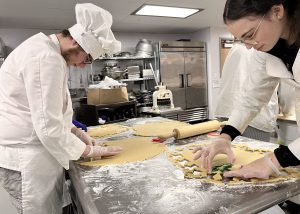 Students making cookies
