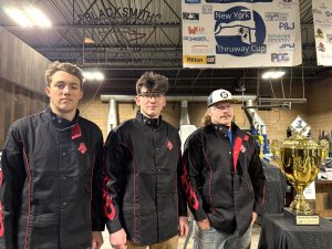 Three boys pose