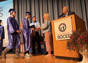 students receiving  diplomas