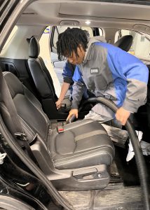 A student vaccums