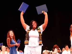 Grad holding diplomas