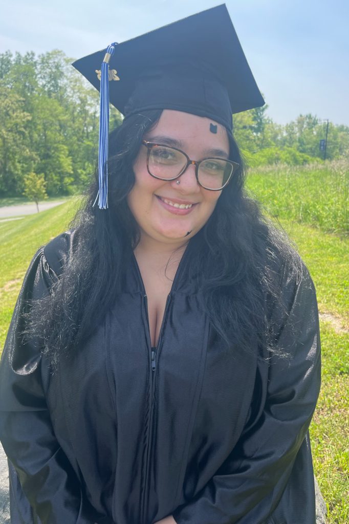 A photo of Maywood Academy graduate Sierrah Rivera in her cap and gown.