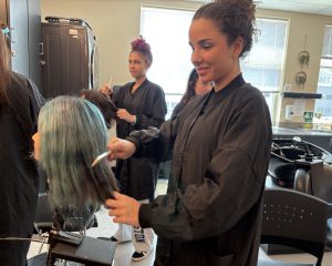 Student combs hair
