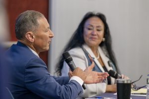 New York School Board Association Executive Director Jay Jay Worona speakers to a room full of students alongside New York State Education Department Commissioner Betty Rosa. 