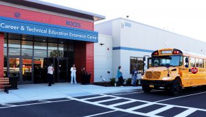 bus in front of the new school