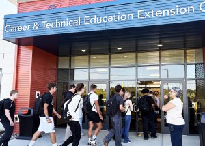 Students enter the new building