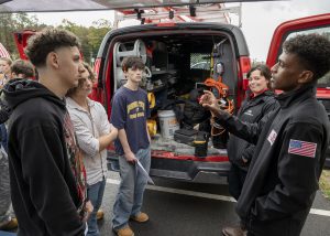 Graduate JJ Jackson, now employeed as a HVAC Maintenance Technician at Crisafulli Bros speaks to students during Careers in Construction Month event at Capital Region BOCES on Wednesday, October 8, 2025.