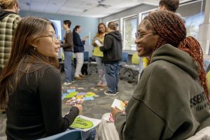Two students have a a one-on-one conversation during a breakout room session.