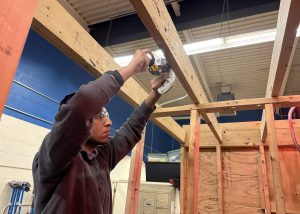 Student on ladder