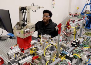 Student programs a robot