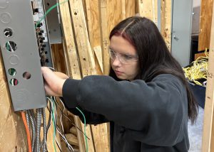 Emily wires a fuse box