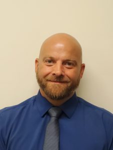 Photo of Region 2, District-Based, Principal John Clausson.