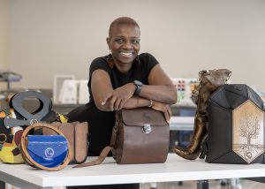 Teacher poses with her bags