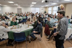 Chef talking to people 