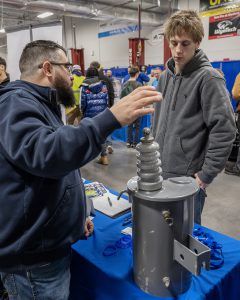 Julius Anderson, Sergio at Shenendehowa in Electrical II, talks with Paul Tatarzewski with TCI NY at CRB Career Fair at Capital Region BOCES in Colonie on Thursday, March 19, 2026.