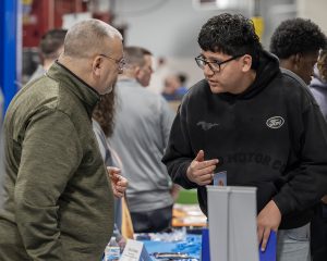 Erica Miller/ Capital Region BOCES Photographer 
Erick Mazariego, senior at Schenectady in Electrical II, talks with Bill Bulger of Tri-City JATC at CRB Career Fair at Capital Region BOCES in Colonie on Thursday, March 19, 2026.