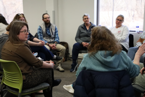 Photo of school librarian in their breakout circles as they discuss their reactions to the film and learn tips for self-care and wellness. 