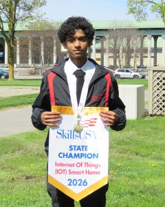 boy holding banner
