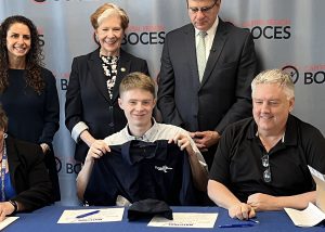 Student and dealership at signing day