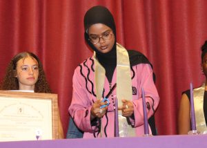 Student lights candle