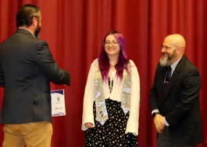 student receives certificate