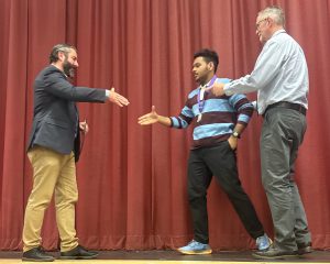 student receives certificate