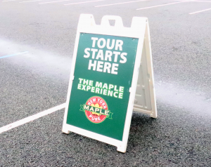 A photo of the NY Maple Experience tour sign.