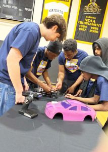 students around the hydrogen car