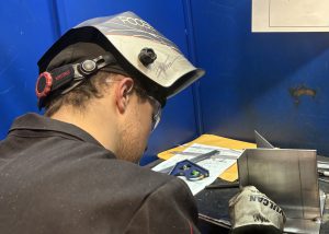 student welding