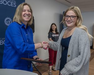 Hadassah Harrell, Cosmetology II of BHBL CSD, receives the SkillsUSA Student of the Year from Deb Toy during Albany CTE Award Ceremony on June 4, 2026.