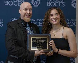 Erica Miller/ Capital Region BOCES Photographer 
Capital Region BOCES Elena Hymes, Criminal Justice II of North Colonie CSD, receives the Faculty Association Outstanding Student of the Year from Ken Bevan during Albany CTE Award Ceremony on Thursday, June 4, 2026.