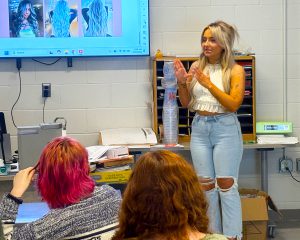 Presenter is animated in front of classroom
