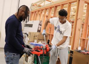 Students work with pipes
