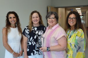 Group photo of award winner Joanne Conlen and members of the BOCES Executive Leadership team.