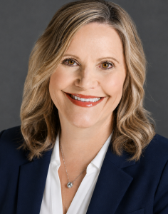 A professional headshot photo of Kelly Masline, Director of Educational Support Services.
