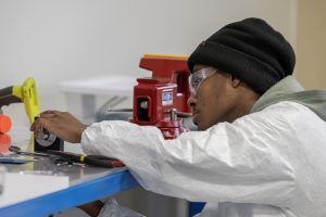 Student working in a lab coat