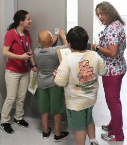 Students and staff participate in the school-wide Scavenger Hunt at Maywood Academy.