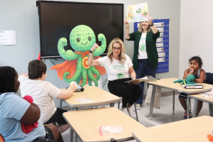 Students enjoy an interactive reading. 